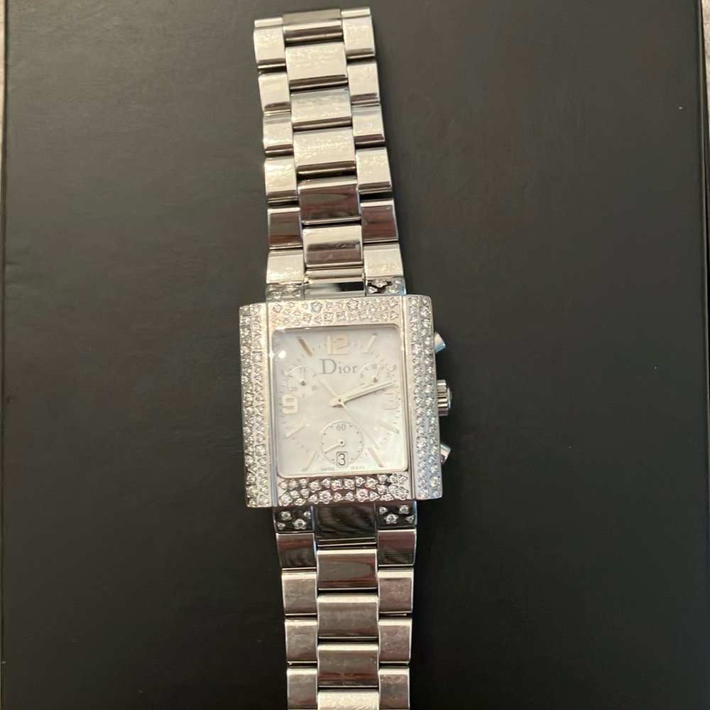 Geniune DIOR Stainless steel watch w/ diamonds. Battery needs to be replaced.